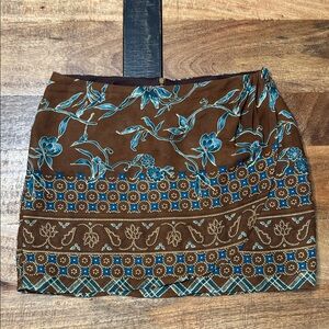 Rampage Vintage crossover mini skirt in brown and turquoise floral pattern